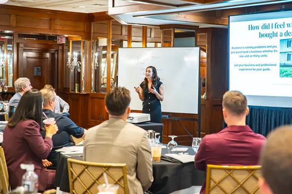 Andrea Stephan Tony and Bedros teaching at real estate mastermind event